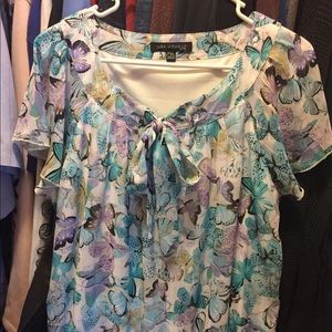 Flowy butterfly design blouse.